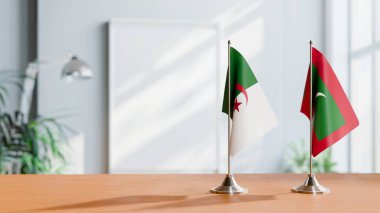 FLAGS OF ALGERIA AND MALDIVES ON TABLE clipart