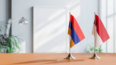 Masanın üzerinde Arminya ve Indonezya 'nın bayrağı
