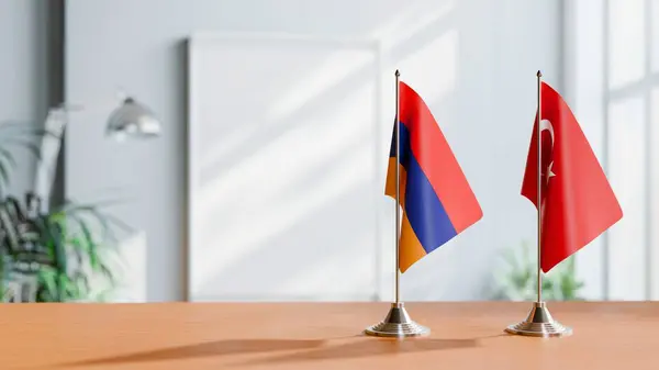 stock image FLAGS OF  ARMENIA AND TURKEY  ON TABLE