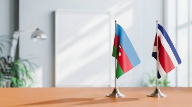 FLAGS OF  AZERBAIJAN AND COSTA RICA  ON TABLE clipart