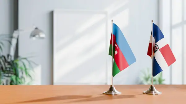 stock image FLAGS OF  AZERBAIJAN AND DOMINICAN REPUBLIC  ON TABLE