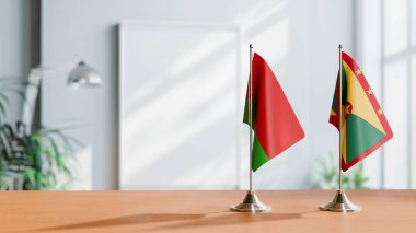 FLAGS OF  BELARUS AND GRENADA  ON TABLE clipart