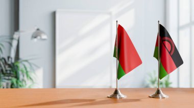 FLAGS OF  BELARUS AND MALAWI  ON TABLE clipart