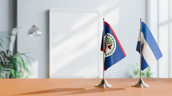 stock image FLAGS OF BELIZE AND NICARAGUA ON TABLE