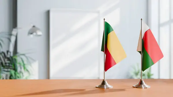 stock image FLAGS OF BENIN AND MADAGASCAR ON TABLE