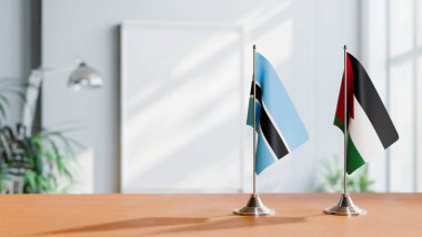 FLAGS OF BOTSWANA AND JORDAN ON TABLE