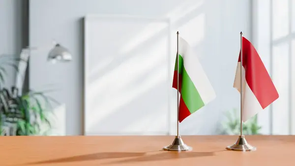 stock image FLAGS OF BULGARIA AND INDONESIA ON TABLE