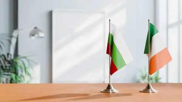 stock image FLAGS OF BULGARIA AND IRELAND ON TABLE