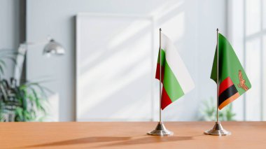 FLAGS OF BULGARIA AND ZAMBIA ON TABLE