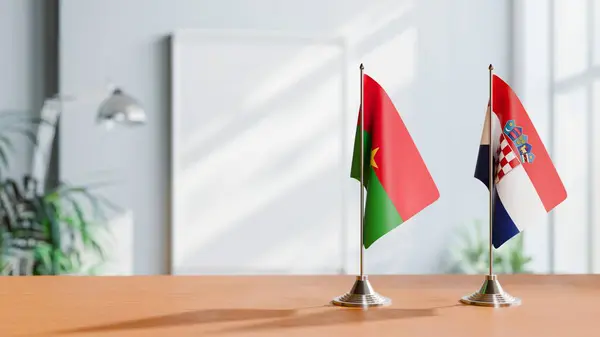 stock image FLAGS OF BURKINA-FASO AND CROATIA ON TABLE