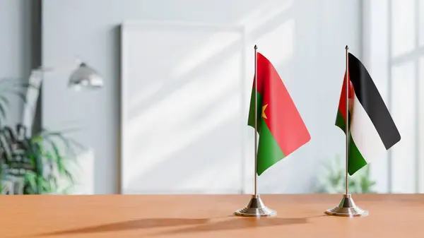 stock image FLAGS OF BURKINA-FASO AND PALESTINE ON TABLE