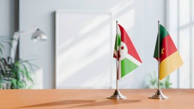 Masanın üzerinde BURUNDI VE CAMEROON BLAGI