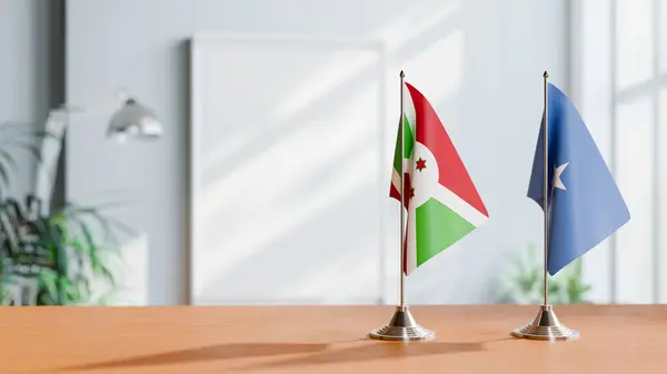 stock image FLAGS OF BURUNDI AND SOMALIA ON TABLE