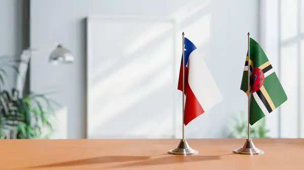 stock image FLAGS OF CHILE AND DOMINICA ON TABLE