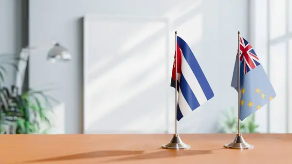 stock image FLAGS OF CUBA AND TUVALU ON TABLE