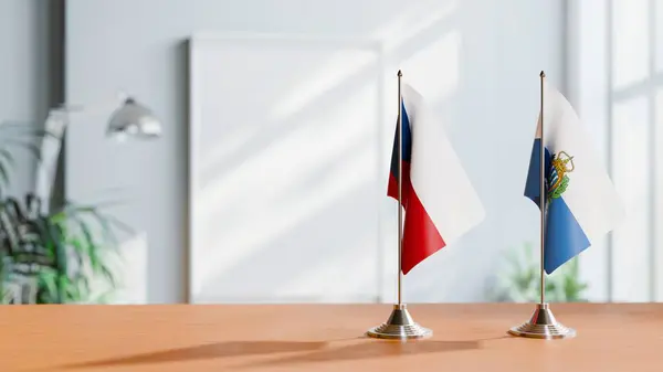 stock image FLAGS OF CZECH REPUBLIC AND SAN MARINO ON TABLE