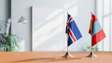 Masanın üzerinde İzlanda ve Moğolistan bayrağı