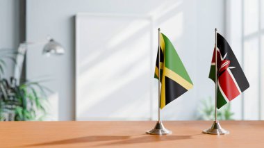 FLAGS OF JAMAICA AND KENYA ON TABLE clipart