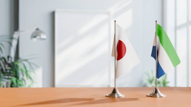 Japon ve Sierra Leon 'un bayrakları.