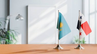 FLAGS OF KAZAKHASTAN AND PANAMA ON TABLE clipart