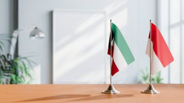 Masanın üzerinde KUWAIT ve Monako 'nun bayrağı