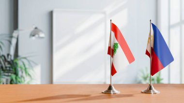 FLAGS OF LEBANON AND PHILIPPINES ON TABLE clipart