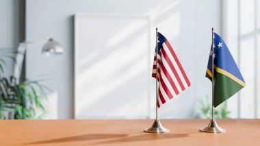 FLAGS OF LIBERIA AND SOLOMON ISLANDS ON TABLE clipart