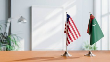 FLAGS OF LIBERIA AND TURKMENISTAN ON TABLE clipart