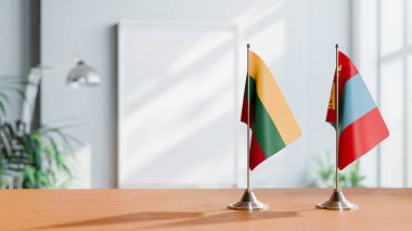 FLAGS OF LITHUANIA AND MONGOLIA ON TABLE clipart