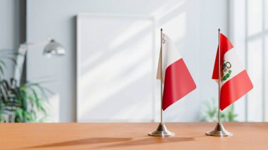 FLAGS OF MALTA AND PERU ON TABLE clipart