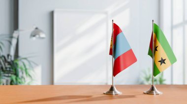 FLAGS OF MONGOLIA AND SAO TOME ON TABLE clipart