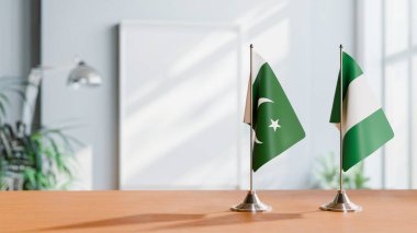 FLAGS OF NIGERIA AND PAKISTAN ON TABLE clipart