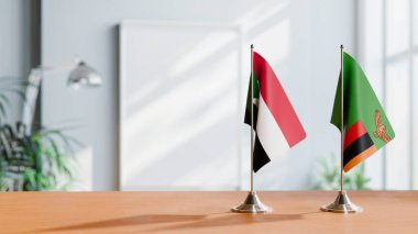 Masanın üzerinde Sudan ve ZAMBİA 'nın bayrağı