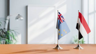 FLAGS OF TUVALU AND YEMEN ON TABLE clipart