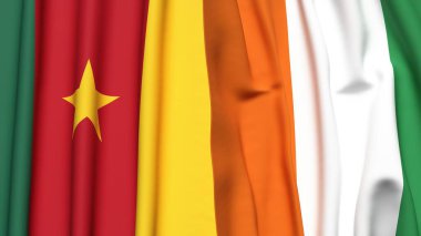 Gerçekçi kumaş dokusuna sahip CAMEROON ve İVORY Kıyı Bayrakları