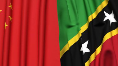 Gerçekçi kumaş dokusuna sahip Çin ve Aziz Kitts bayrakları.