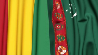Guinea ve Türkmenistan bayrakları gerçekçi kumaş dokusuyla