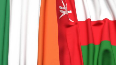 IRELAND ve OMAN bayrakları gerçekçi kumaş dokusuyla