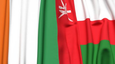 IVORY Kıyı ve OMAN bayrakları gerçekçi kumaş desenli