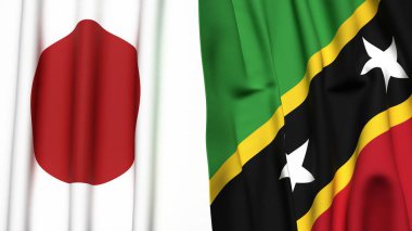 Gerçekçi kumaşlı Japon ve Aziz Kitts bayrakları.