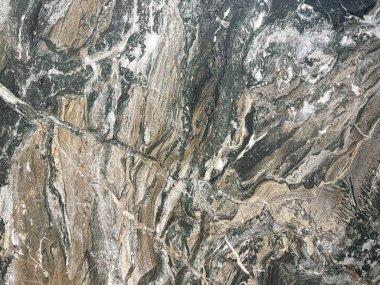 Egzotik çamur mermer, dikişsiz arka plan dokusu. Siyah ve beyaz damarları olan sıradan egzotik toprak çamur mermeri..