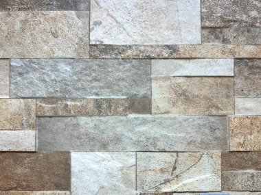 Doğal dikdörtgen kesimli, kahverengi ve gri toprak tonlu parke tuğla deseni..