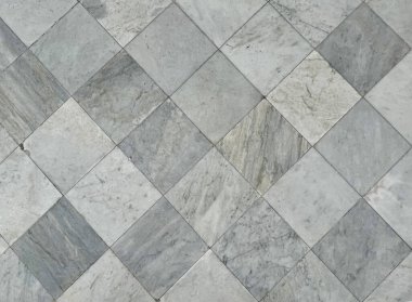 Kare kare şeklinde kesilmiş doğal ve lüks beyaz mermer, koyu gri damarlar, İtalya 'dan gelen beyaz carrara doğal mermeri. Kusursuz doku.