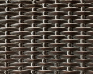 Pek çok farklı renkte sentetik rattan dokusunun güzel el dokusunun yakın fotoğrafını çek. Hasır sanatı ya da rattan dokuma sanatı pek çok şekilde şekillenmiştir. Kusursuz doku.