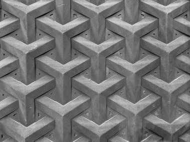 Modern geometrik goyard desen tasarımına yakın çekim. Ahşap bir panele oyulmuş, tek renkli, koyu gri ve siyah renkli goyard deseni, şekil deseni. Kusursuz arkaplan dokusu.