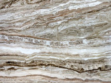 Doğal bej ve kahverengi mermer dikişsiz doku. Travertine mermer arkaplan damarlarını kapat.