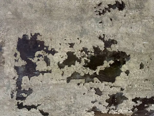 Soyut yıpranmış ve beton duvar dokusu soyulmuş. Kusursuz bir geçmişi var. Grafik görüntüler ve açık hava materyalleri için uygun. Açığa çıkan duvar ve yıpranma süreci.