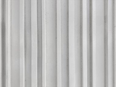 Close up of white fluted panel, wood strips or fluted panel strips, in white paint. Seamless background texture. clipart