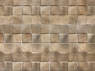El yapımı ahşap mozaik duvar fayanslarını kapatın. Kare kereste ahşap mozaik fayans doğal kahverengi renk, dikişsiz arkaplan dokusu.