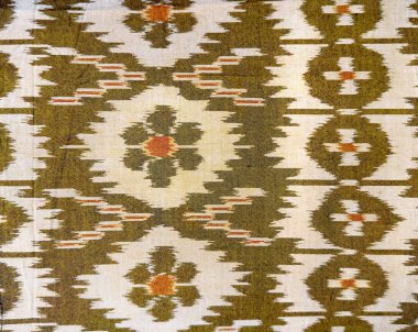 Rastgele soyut ve çiçekli geleneksel etnik kumaş desenleri, etnik kumaştan boyanmış el kusursuz arkaplan dokusu..